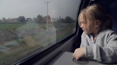 Girl looking out the window on the train Stock Footage 46226820