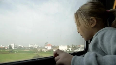 Girl looking out the window on the train Stock Footage 46226827