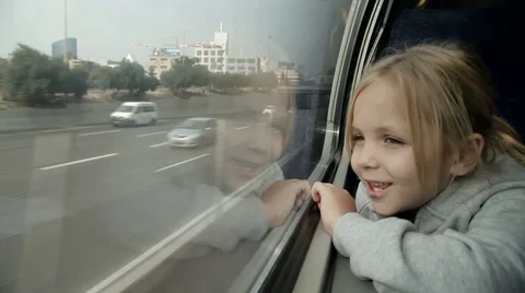 Girl looking out the window on the train Stock Footage 46226833