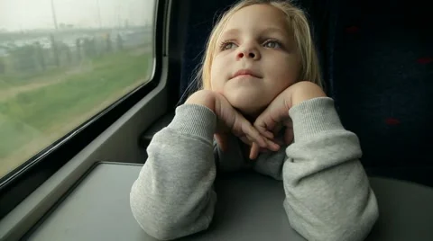 Girl looking out the window on the train Stock Footage 46226845