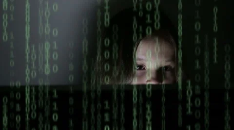 Girl looking at screen with code overlay Stock Footage 58592341