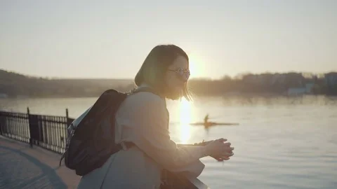 Girl looking at the sunset Stock Footage 73938162