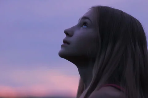 Girl Looking Up Sunset Sky Hope, Saying Prayer NTSC Stock Footage