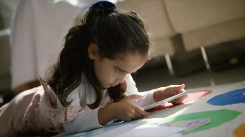Girl looking at tablet. Stock Footage 135997506