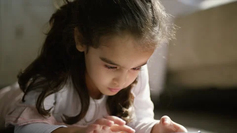 Girl looking at tablet. Stock Footage 136000019