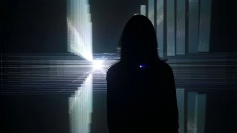 Girl looks at a visual installation Stock Footage