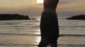girl in love runs to her boyfriend into the sea - hugs and kisses - sunset HD Footage