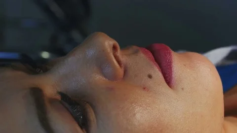 Girl lying close-up of face Stock Footage