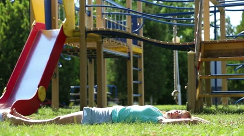 Girl lying on the grass Stock Footage 52435514