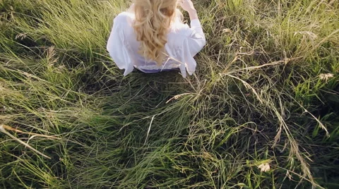 Girl lying in the grass Stock Footage 66519245