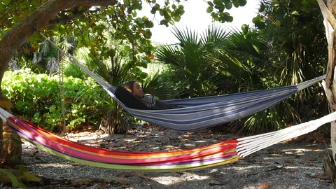 Girl lying in hammock Stock Footage 106192732
