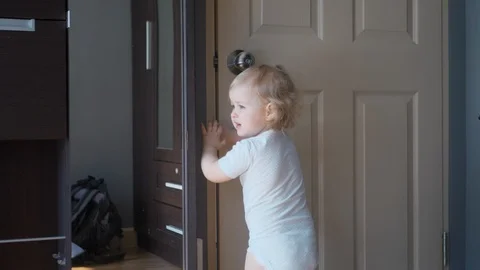 Girl make her first steps indoor. 4k UHD. Slow Motion Vídeos de archivo 87501086