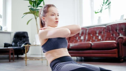 Girl make six-pack workout at home 스톡 동영상 106209032