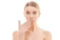 The girl makes an air kiss on the white background Photo
