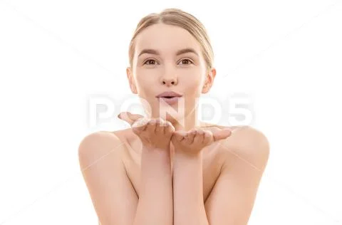 The girl makes an air kiss on the white background Stock Photos