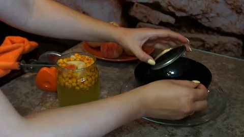 Girl makes compote Stock Footage 80189343