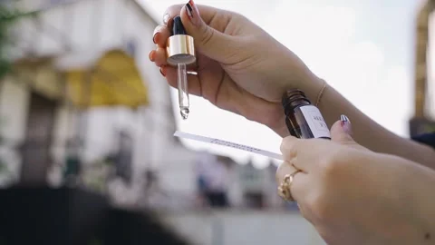 The girl makes a perfume sample Stock Footage 246745457