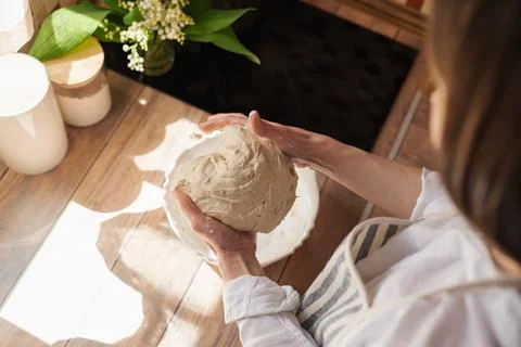 Girl making dough for baking bread, top view Stock Photos
