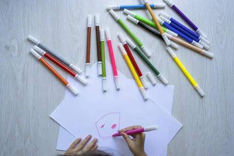 Girl  making a drawing Stock Photos