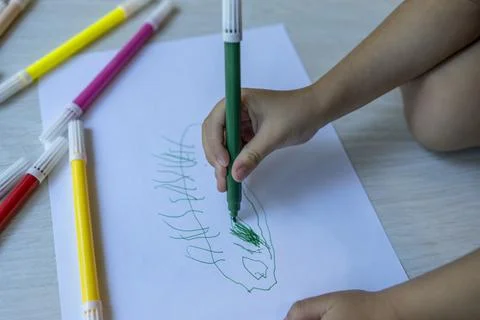 Girl  making a drawing Stock Photos