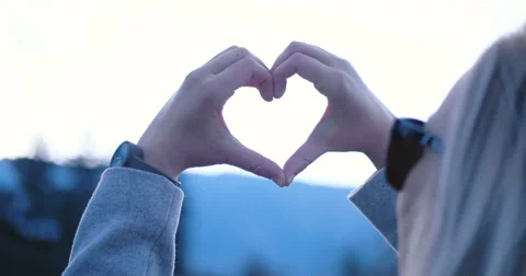 Girl Making Heart Shape With Hands Video stock 59584124