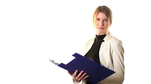 Girl making notes shot on white back ground Stock Footage 42139330