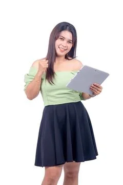 Girl managed to win  operating a tablet clenching her fist while saying yes Stock Photos
