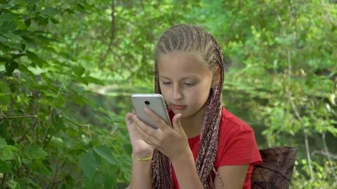 Girl with mobile phone Stock Footage