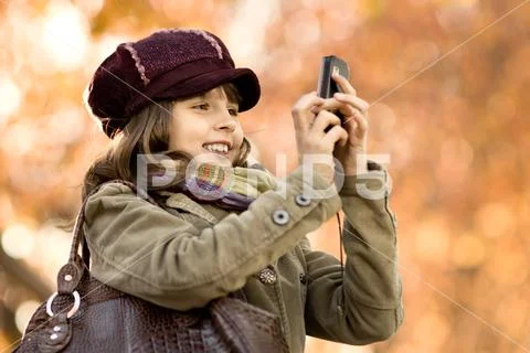 Girl with mobile phone Stock Photos