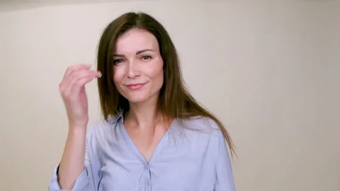 Girl model posing in front of the camera in the studio 스톡 동영상 145366578