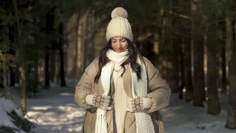 Girl model posing in the sun in a snowy forest. Stock Footage 154205791