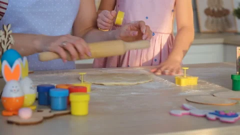 Girl with Mom Making Dough for Easter Cookies Stock Footage 147443525