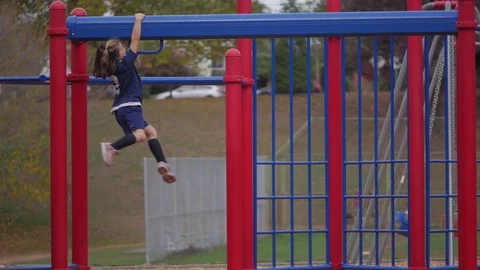 Girl On Monkey Bars - Playground Video stock 97671632