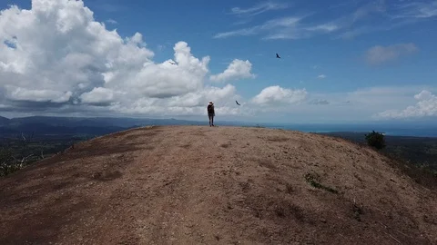 A girl on a mountain Stock Footage 128299689