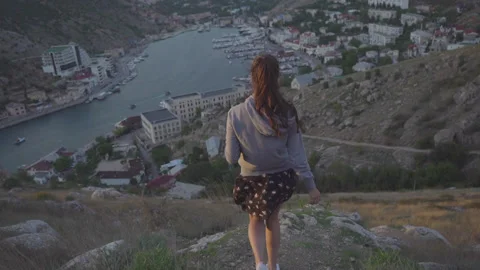 Girl on the mountain Video stock 130839917