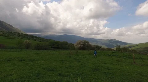 Girl in the mountains Stock Footage 63320847