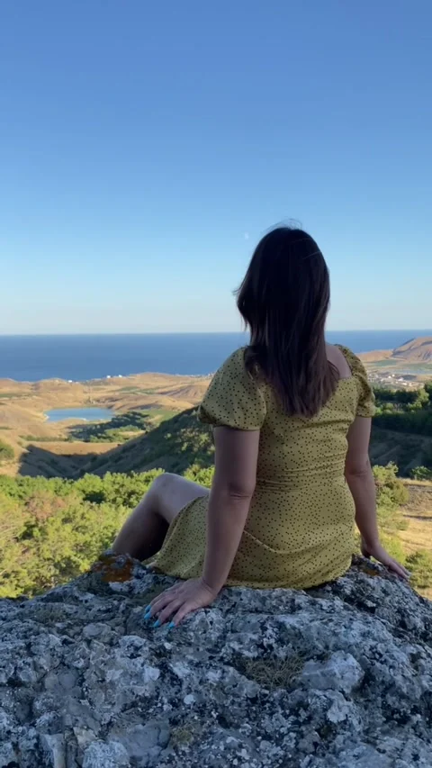 Girl in the mountains Stock Footage 320353944