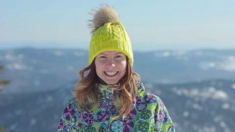 Girl in mountains smiling at camera Stock Footage 73286978