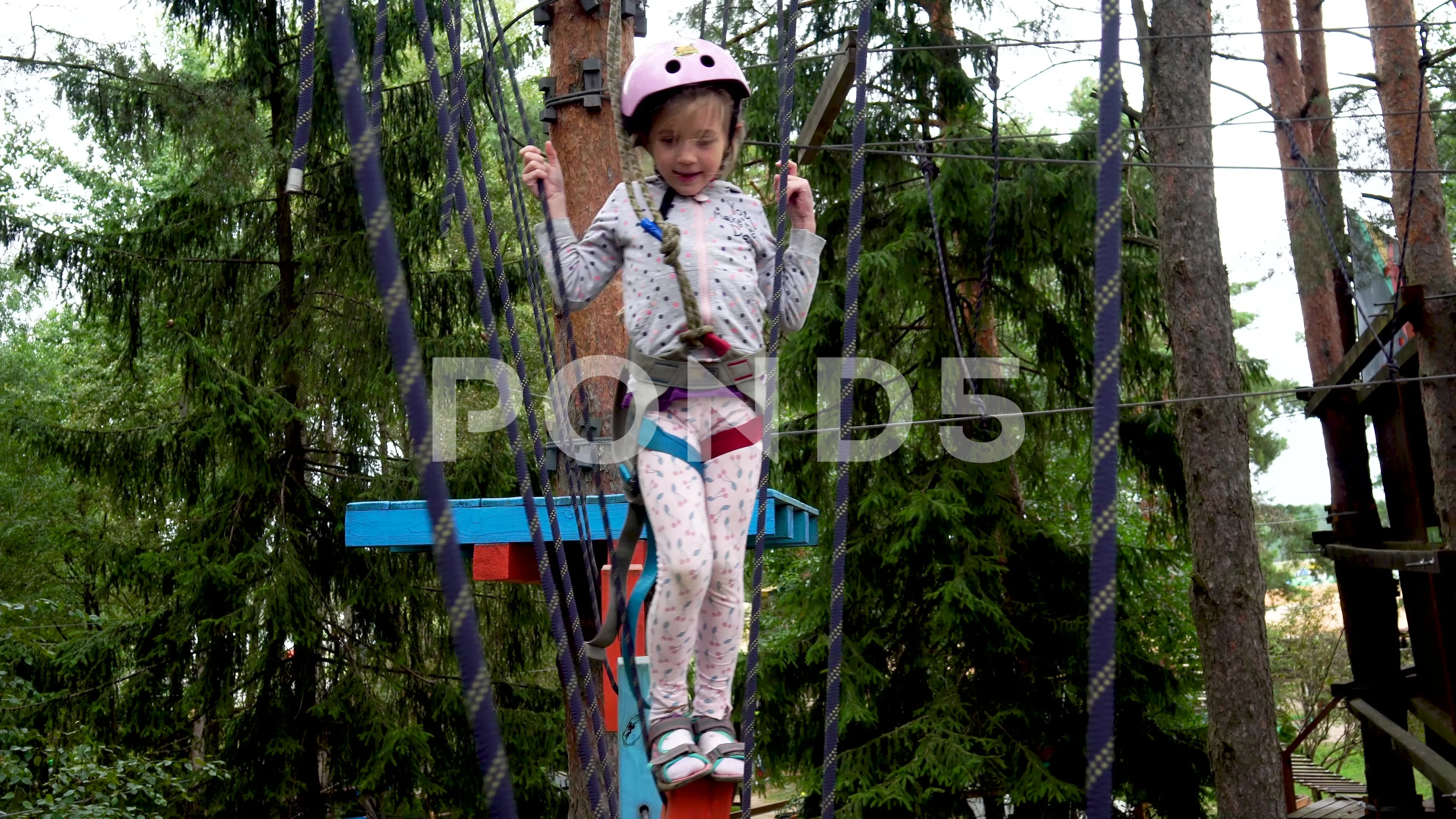 https://images.pond5.com/girl-moving-rope-parks-hanging-footage-163977891_prevstill.jpeg