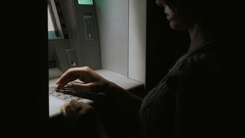 Girl at night enters pin code in ATM Stock Footage 110794593