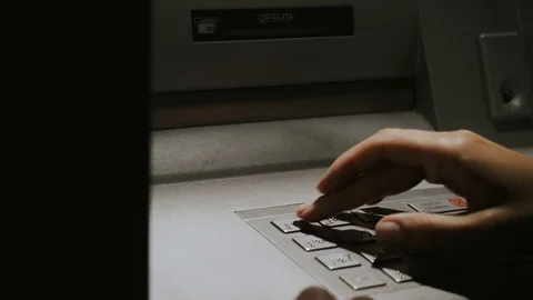 Girl at night enters pin code in ATM Stock Footage 110794824
