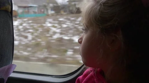 Girl is Observing a Village Houses Bare Branches Trees Little Blonde Girl is Stock Footage 59135607