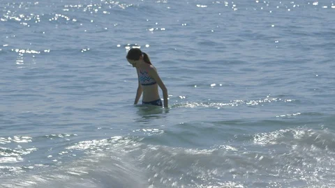 Girl in the ocean Stock Footage 90102893