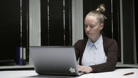 The girl in the office working on the computer. Stock Footage 73885252