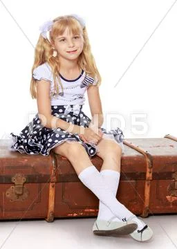 Girl with old suitcase Stock Photos