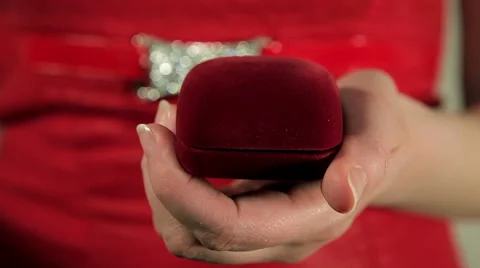 The girl opens a box with ring Stock Footage 46838796