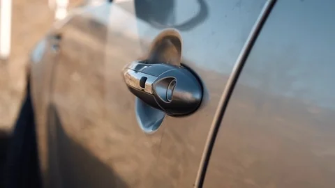 Girl opens a car with keyless access Stock Footage 118211657