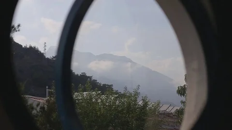 The girl opens the window Stock Footage 83107388