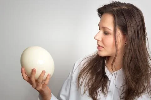 Girl with ostrich egg Stock-Fotos