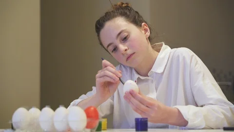 Girl Paint an Easter Egg Stock Footage 105706497